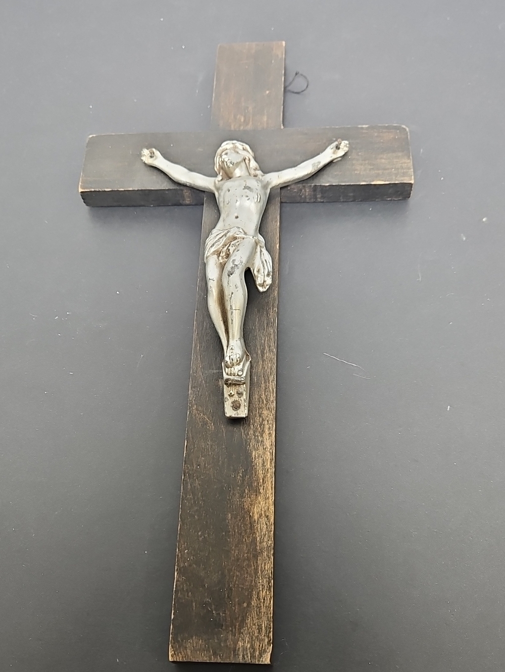 Wall Crucifix with Silver-Tone Corpus on Dark Wood